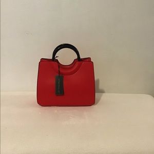 Cartera nueva $16